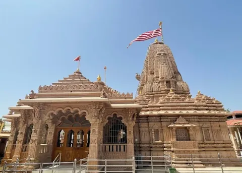 Carved sandstone temple of Ashapura Mata at Mata no Madh, with a striped flag on its spire